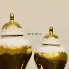 Gold and White Ceramic Urn Set